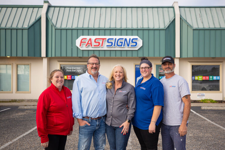 The FASTSIGNS team from left to right: Chelsea Parkhurst, co-owners Mike and JJ Snyder, Kylie Emfinger, and Jimmie Parkhurst. — Photo Meganpixels Parker