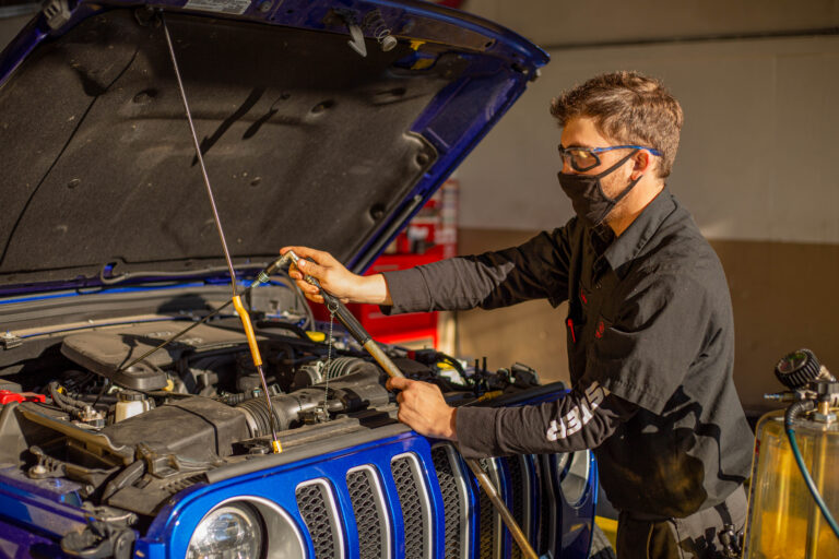 Mechanic works on cars