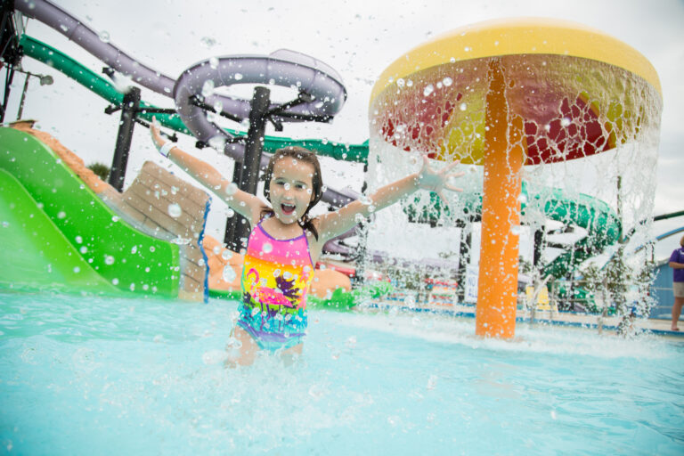 picture of small child in a myrtle beach waterpark, splashing in the water