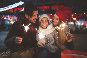 Family with daughter enjoying New Year