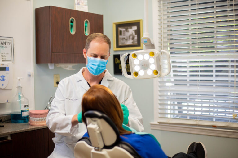 Dr. Dan examines a patient in the newly updated office.