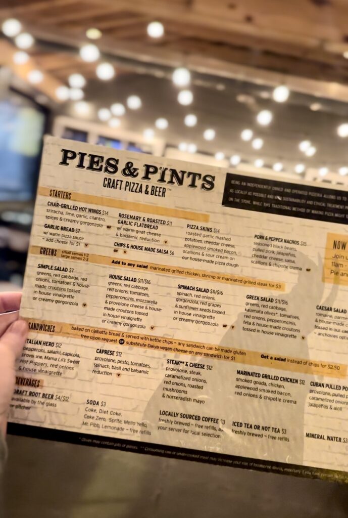 Menu of Pies & Pints, Fayetteville, WV A selection of handcrafted pizzas, ranging from classic Margherita to unique local specialties, alongside an extensive list of craft beers and ales